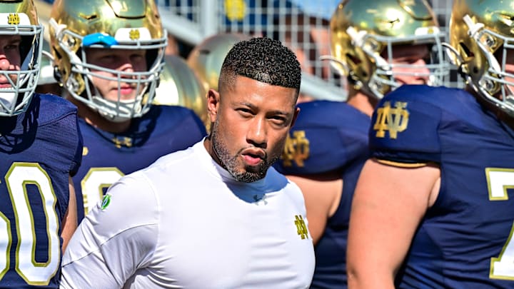 Sep 21, 2024; South Bend, Indiana, USA; Notre Dame Fighting Irish head coach Marcus Freeman prepares to lead his players onto the field for the game against the Miami Redhawks at Notre Dame Stadium.