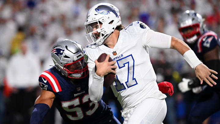 Oct 5, 2025; Orchard Park, New York, USA; Buffalo Bills quarterback Josh Allen (17) rushes the ball past New England Patriots linebacker Christian Elliss (53) during the first half at Highmark Stadium. Oct 5, 2025; Orchard Park, New York, USA; Buffalo Bills quarterback Josh Allen (17) rushes the ball past New England Patriots linebacker Christian Elliss (53) during the first half at Highmark Stadium.