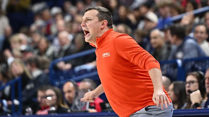 Dec 17, 2025; Spokane, Washington, USA; Campbell Fighting Camels head coach John Andrzejek looks on against the Gonzaga Bulldogs in the first half at McCarthey Athletic Center. Mandatory Credit: James Snook-Imagn Images Dec 17, 2025; Spokane, Washington, USA; Campbell Fighting Camels head coach John Andrzejek looks on against the Gonzaga Bulldogs in the first half at McCarthey Athletic Center. Mandatory Credit: James Snook-Imagn Images