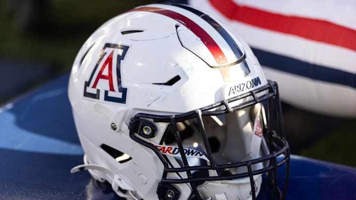 Nov 8, 2025; Tucson, Arizona, USA; Detailed view of an Arizona Wildcats helmet at Arizona Stadium. Mandatory Credit: Mark J. Rebilas-Imagn Images Nov 8, 2025; Tucson, Arizona, USA; Detailed view of an Arizona Wildcats helmet at Arizona Stadium. Mandatory Credit: Mark J. Rebilas-Imagn Images
