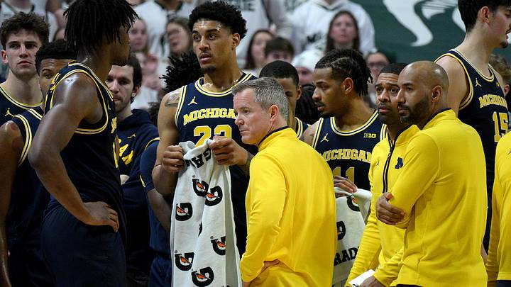 Jan 30, 2026; East Lansing, Michigan, USA;  Michigan Wolverines head coach Dusty May waits for referees to make a call against the Michigan State Spartans during the first half at Jack Breslin Student Events Center. Mandatory Credit: Dale Young-Imagn Images