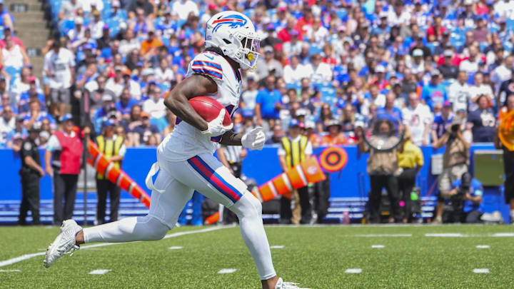 Buffalo Bills WR KJ Hamler runs back a kick off against the Chicago Bears during the first half at Highmark Stadium.