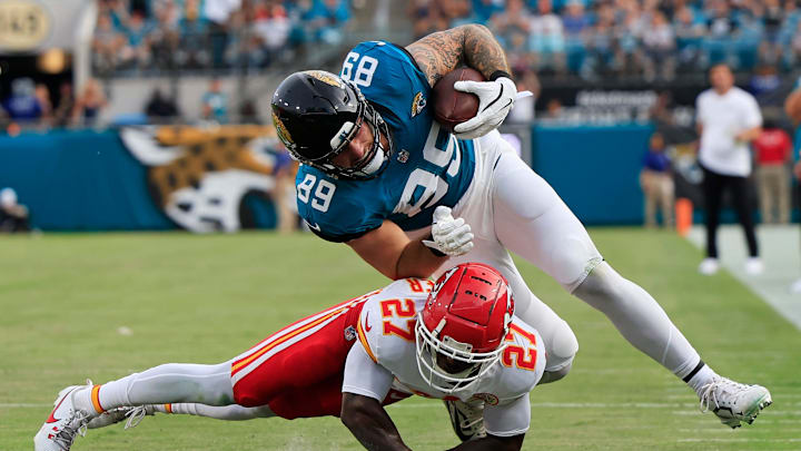 Jacksonville Jaguars tight end Luke Farrell (89) is tackled by Kansas City Chiefs defensive back Chamarri Conner (27) after rushing for yards during the first quarter of a preseason NFL football game Saturday, Aug. 10, 2024 at EverBank Stadium in Jacksonville, Fla. [Corey Perrine/Florida Times-Union]