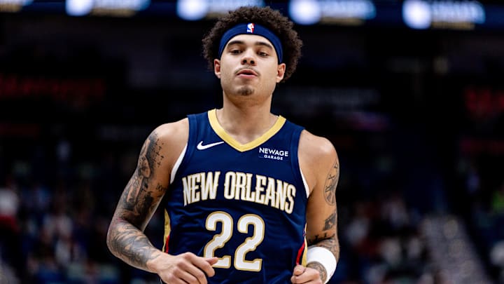Mar 24, 2025; New Orleans, Louisiana, USA;  New Orleans Pelicans guard Lester Quinones (22) looks on against the Philadelphia 76ers during the second half at Smoothie King Center. Mandatory Credit: Stephen Lew-Imagn Images