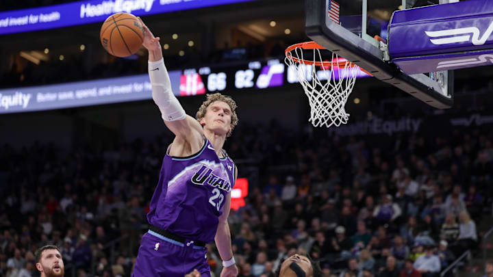 Dec 1, 2025; Salt Lake City, Utah, USA;  Utah Jazz forward Lauri Markkanen (23) blocks the shot of Houston Rockets guard Amen Thompson (1) during the second half at Delta Center. Mandatory Credit: Chris Nicoll-Imagn Images