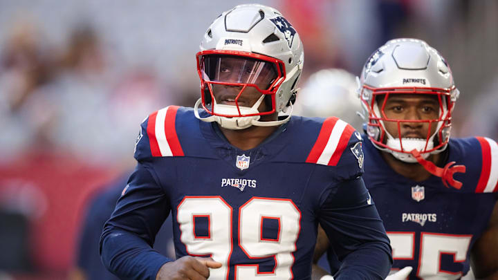 Dec 15, 2024; Glendale, Arizona, USA; New England Patriots defensive end Keion White (99) against the Arizona Cardinals at State Farm Stadium. Mandatory Credit: Mark J. Rebilas-Imagn Images