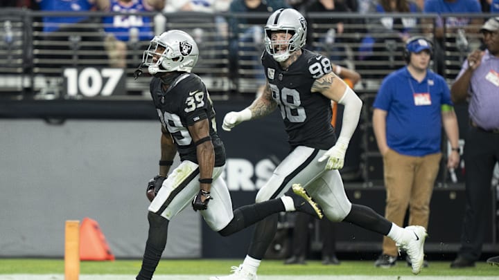November 5, 2023; Paradise, Nevada, USA; Las Vegas Raiders cornerback Nate Hobbs (39) and defensive end Maxx Crosby (98) celebrate after an interception by Hobbs against the New York Giants during the second quarter at Allegiant Stadium. Mandatory Credit: Kyle Terada-Imagn Images November 5, 2023; Paradise, Nevada, USA; Las Vegas Raiders cornerback Nate Hobbs (39) and defensive end Maxx Crosby (98) celebrate after an interception by Hobbs against the New York Giants during the second quarter at Allegiant Stadium. Mandatory Credit: Kyle Terada-Imagn Images