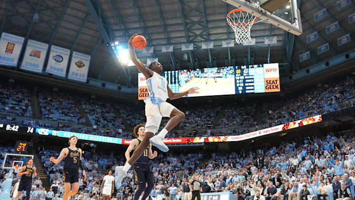 Jan 21, 2026; Chapel Hill, North Carolina, USA; North Carolina Tar Heels forward Caleb Wilson (8) scores in the second half at Dean E. Smith Center. Mandatory Credit: Bob Donnan-Imagn Images