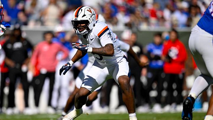 Oct 17, 2026; Dallas, Texas, USA; Virginia Cavaliers linebacker Kam Robinson (5) in action during the game between the Mustangs and the Cavaliers at Gerald J. Ford Stadium. Mandatory Credit: Jerome Miron-Imagn Images