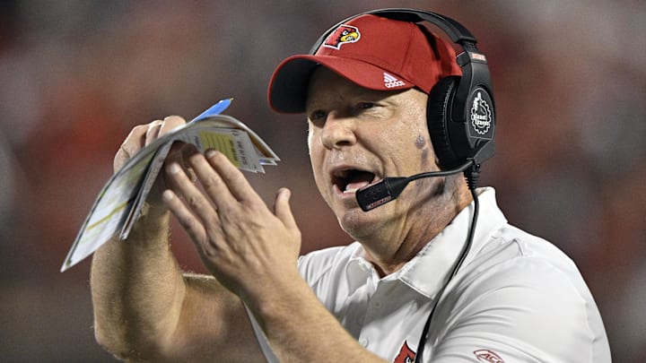 Sep 5, 2025; Louisville, Kentucky, USA;  Louisville Cardinals head coach Jeff Brohm calls a timeout during the second half against the James Madison Dukes at L&N Federal Credit Union Stadium. Louisville defeated James Madison 28-14. Mandatory Credit: Jamie Rhodes-Imagn Images
