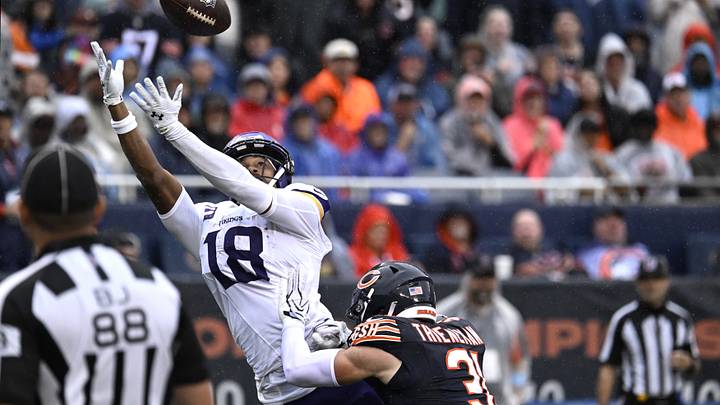 Sep 20, 2026; Chicago, Illinois, USA; Minnesota Vikings wide receiver Justin Jefferson (18) catches a pass against Chicago Bears safety Dillon Thieneman (31) during the first quarter at Soldier Field. Mandatory Credit: Matt Marton-Imagn Images Sep 20, 2026; Chicago, Illinois, USA; Minnesota Vikings wide receiver Justin Jefferson (18) catches a pass against Chicago Bears safety Dillon Thieneman (31) during the first quarter at Soldier Field. Mandatory Credit: Matt Marton-Imagn Images