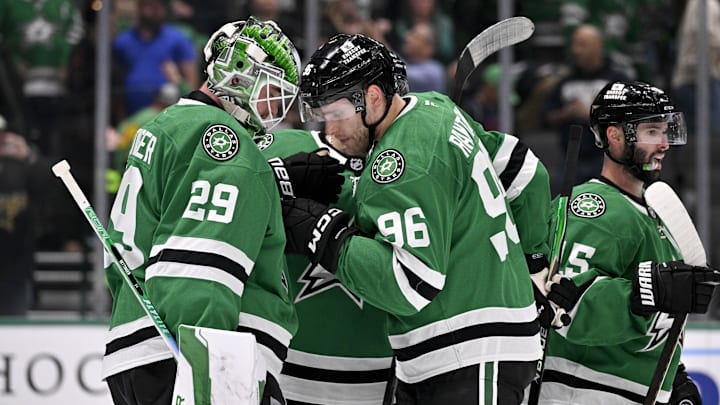 Nov 15, 2025; Dallas, Texas, USA; Dallas Stars goaltender Jake Oettinger (29) and right wing Mikko Rantanen (96) celebrate the victory over the Philadelphia Flyers at the American Airlines Center. Mandatory Credit: Jerome Miron-Imagn Images