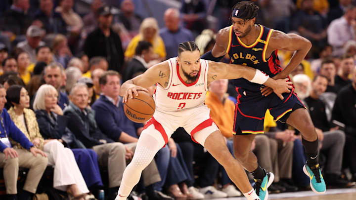 Apr 28, 2025; San Francisco, California, USA; Houston Rockets forward/guard Dillon Brooks (9) holds off Golden State Warriors guard Buddy Hield (7) during the third quarter of game four of the 2025 NBA Playoffs first round at Chase Center. Mandatory Credit: Kelley L Cox-Imagn Images