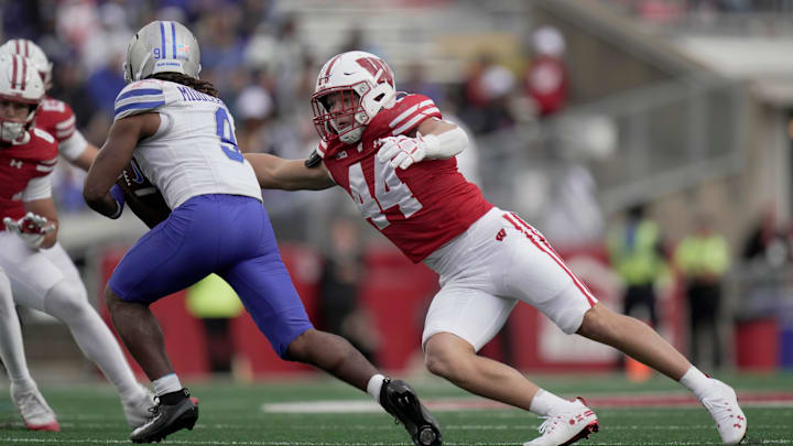 Wisconsin linebacker Cooper Catalano (44) tackles Middle Tennessee running back Jekail Middlebrook (9) during the fourth quarter of the game Saturday, September 6, 2025 at Camp Randall Stadium in Madison, Wisconsin. Wisconsin beat Middle Tennessee 42-10. Wisconsin linebacker Cooper Catalano (44) tackles Middle Tennessee running back Jekail Middlebrook (9) during the fourth quarter of the game Saturday, September 6, 2025 at Camp Randall Stadium in Madison, Wisconsin. Wisconsin beat Middle Tennessee 42-10.