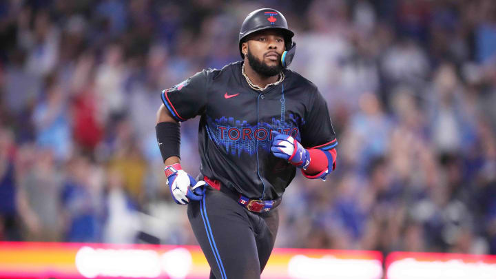 Jun 28, 2024; Toronto, Ontario, CAN; Toronto Blue Jays first base Vladimir Guerrero Jr. (27) runs the bases after hitting a home run against the New York Yankees during the seventh inning at Rogers Centre.