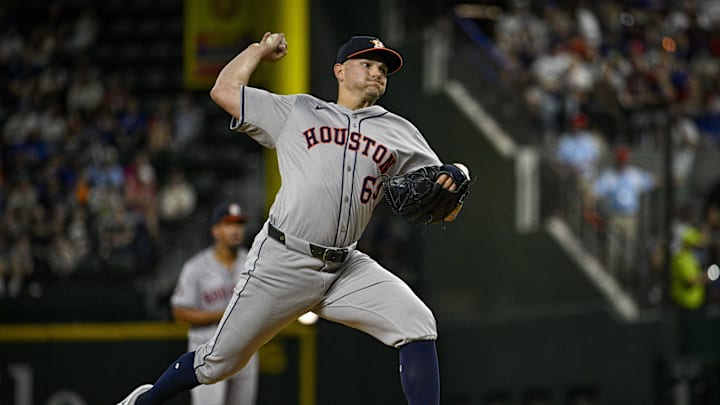 Apr 5, 2024; Arlington, Texas, USA; Houston Astros relief pitcher Brandon Bielak (64) pitches against the Texas Rangers during the game at Globe Life Field. Mandatory Credit: Jerome Miron-Imagn Images
