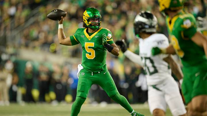 Sep 18, 2026; Eugene, Oregon, USA; Oregon Ducks quarterback Dante Moore (5) throws a pass during the first half against the Portland State Vikings at Autzen Stadium. Mandatory Credit: Troy Wayrynen-Imagn Images