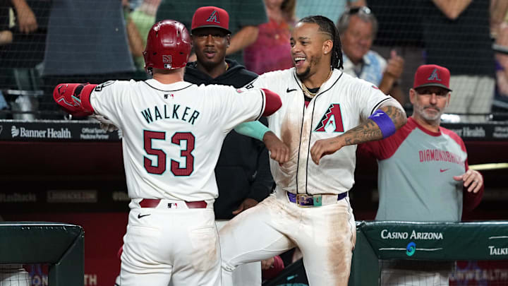 Jun 13, 2024; Phoenix, Arizona, USA; Arizona Diamondbacks first base Christian Walker (53) celebrates with Arizona Diamondbacks second base Ketel Marte (4) after hitting during a solo home run against the Los Angeles Angels the third inning at Chase Field. Mandatory Credit: Joe Camporeale-USA TODAY Sports Jun 13, 2024; Phoenix, Arizona, USA; Arizona Diamondbacks first base Christian Walker (53) celebrates with Arizona Diamondbacks second base Ketel Marte (4) after hitting during a solo home run against the Los Angeles Angels the third inning at Chase Field. Mandatory Credit: Joe Camporeale-USA TODAY Sports