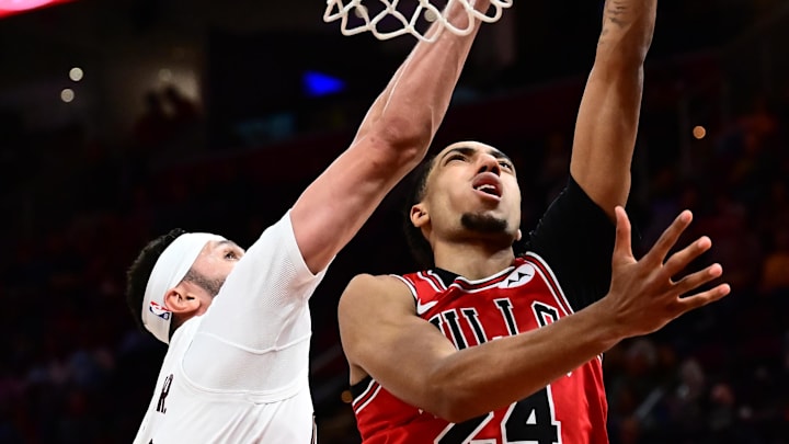 Oct 7, 2025; Cleveland, Ohio, USA; Chicago Bulls forward Noa Essengue (24) drives to the basket against Cleveland Cavaliers forward Larry Nance Jr. (22) during the second half at Rocket Arena.