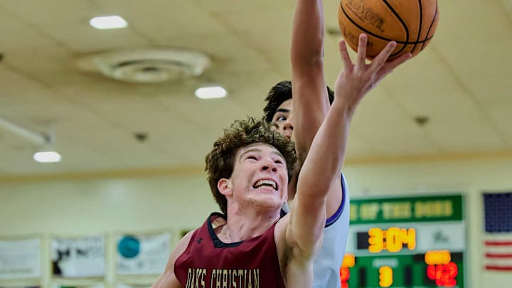 Brady Sullivan of Oaks Christian drives to the basket against Franklin High.