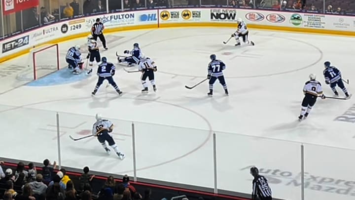 Erie Otters forward Gabriel Frasca, from the left circle, wrists a shot past Sudbury goaltender Owen Leonard with eight seconds left in the second period of the teams' Oct. 11, 2025, Ontario Hockey League game at Erie Insurance Arena. Sudbury won 6-3.
