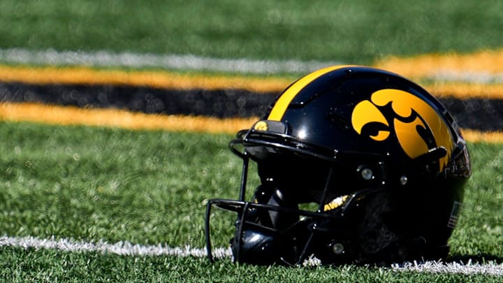 An Iowa Hawkeyes helmet lays on the field before a football game against the Indiana Hoosiers Sept. 27, 2025 at Kinnick Stadium in Iowa City, Iowa.