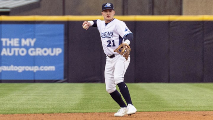 West Michigan Whitecaps shortstop Kevin McGonigle looks to throw the ball to a teammate on Friday, April, 4, at LMCU Ballpark in Comstock Park, Mich. West Michigan Whitecaps shortstop Kevin McGonigle looks to throw the ball to a teammate on Friday, April, 4, at LMCU Ballpark in Comstock Park, Mich.