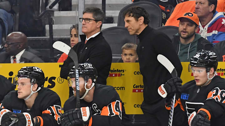 Mar 27, 2025; Philadelphia, Pennsylvania, USA; Philadelphia Flyers interim head coach Brad Shaw and assistant coach Rocky Thompson behind the bench against the Montreal Canadiens during the second period at Wells Fargo Center. Mandatory Credit: Eric Hartline-Imagn Images