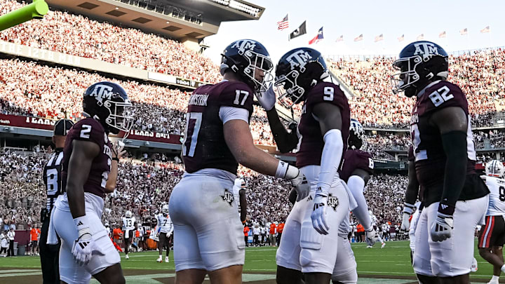 Sep 21, 2024; College Station, Texas, USA; Texas A&M Aggies tight end Theo Melin Ohrstrom (17) celebrates scoring a touchdown in the first quarter against the Bowling Green Falcons at Kyle Field. Mandatory Credit: Maria Lysaker-Imagn Images.
