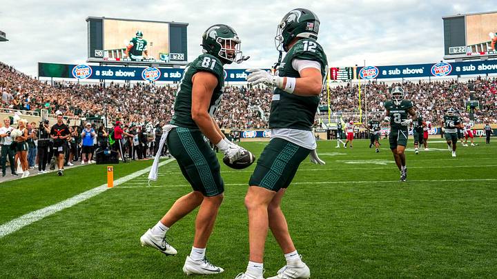 Michigan State's Michael Masunas, left, celebrates his touchdown catch with Jack Velling against Youngstown State during the third quarter on Saturday, Sept. 13, 2025, at Spartan Stadium in East Lansing. Michigan State's Michael Masunas, left, celebrates his touchdown catch with Jack Velling against Youngstown State during the third quarter on Saturday, Sept. 13, 2025, at Spartan Stadium in East Lansing.