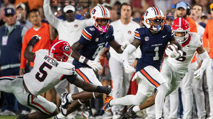 Auburn Tigers wide receiver Eric Singleton Jr. (1) turns up field after a catch as Auburn Tigers take on Georgia Bulldogs at Jordan-Hare Stadium in Auburn, Ala. on Saturday, Oct. 11, 2025.