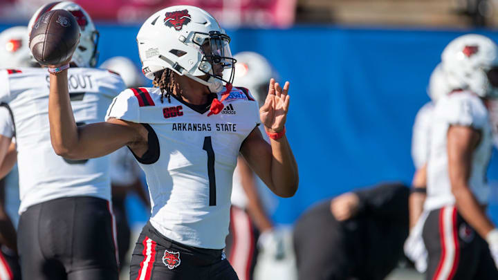 Arkansas State Red Wolves quarterback Jaylen Raynor (1) warms up before Arkansas State Red Wolves take on the Northern Illinois Huskies during the Camellia Bowl at Cramton Bowl in Montgomery, Ala., on Saturday, Dec. 23, 2023.