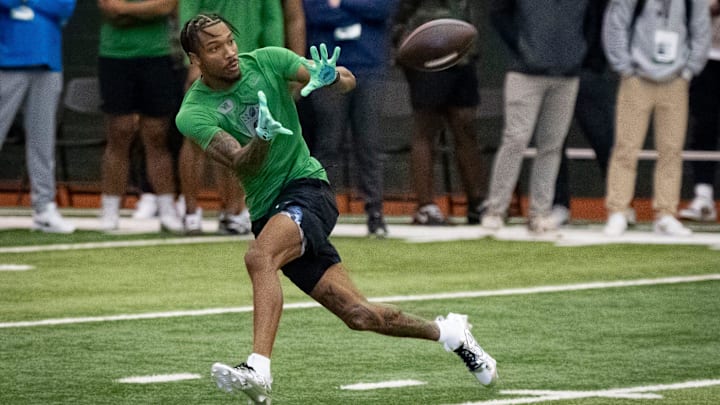 Oregon wide receiver Tez Johnson catches a pass during the Oregon football’s Pro Day Tuesday, March 18, 2025, at the Moshofsky Center in Eugene, Ore.