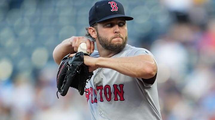Aug 7, 2024; Kansas City, Missouri, USA; Boston Red Sox starting pitcher Kutter Crawford (50) pitches during the first inning against the Kansas City Royals at Kauffman Stadium.