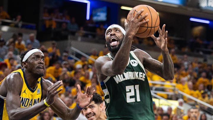 May 2, 2024; Indianapolis, Indiana, USA; Milwaukee Bucks guard Patrick Beverley (21) shoots the ball while Indiana Pacers forward Pascal Siakam (43) defends during game six of the first round for the 2024 NBA playoffs at Gainbridge Fieldhouse. Mandatory Credit: Trevor Ruszkowski-Imagn Images