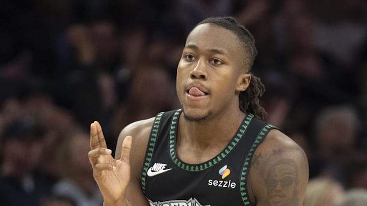 Mar 5, 2026; Minneapolis, Minnesota, USA; Minnesota Timberwolves guard Ayo Dosunmu (13) celebrates making a shot against the Toronto Raptors in the second half at Target Center. Mandatory Credit: Jesse Johnson-Imagn Images