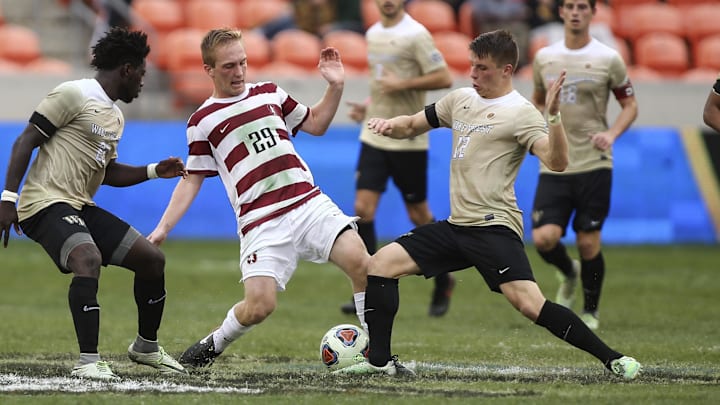 Dec 11, 2016; Houston, TX, USA; Stanford Cardinal midfielder Derek Waldeck (29) and Wake Forest Demon Deacons midfielder Brad Dunwell (12) battle for the ball during overtime at BBVA Compass Stadium. Mandatory Credit: Troy Taormina-Imagn Images Dec 11, 2016; Houston, TX, USA; Stanford Cardinal midfielder Derek Waldeck (29) and Wake Forest Demon Deacons midfielder Brad Dunwell (12) battle for the ball during overtime at BBVA Compass Stadium. Mandatory Credit: Troy Taormina-Imagn Images