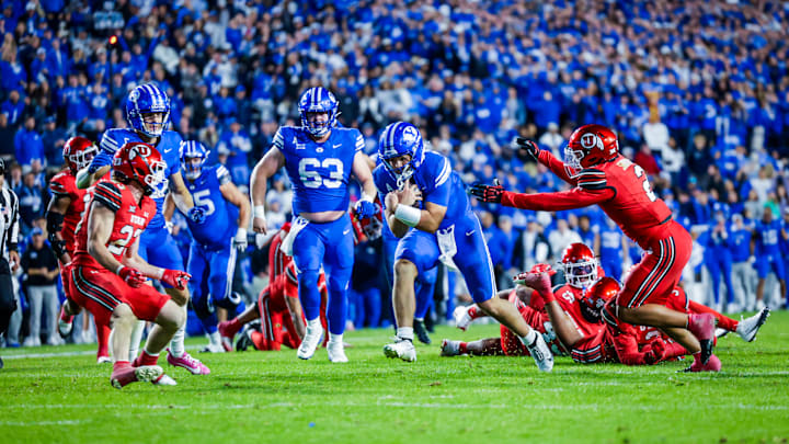 BYU quarterback Bear Bachmeier scores a touchdown against Utah BYU quarterback Bear Bachmeier scores a touchdown against Utah