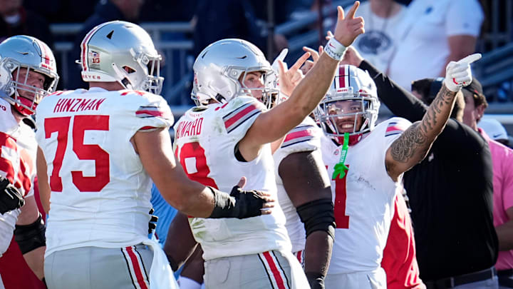 Ohio State Buckeyes quarterback Will Howard (18) celebrates a first down run during the NCAA football game against the Penn State Nittany Lions at Beaver Stadium in University Park, Pa. on Monday, Nov. 4, 2024. Ohio State won 20-13.