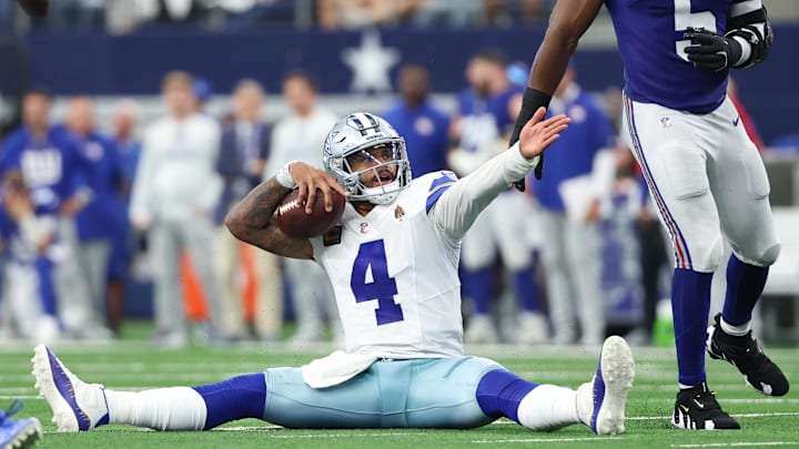 Dallas Cowboys quarterback Dak Prescott reacts after a play against the New York Giants during overtime at AT&T Stadium. 
