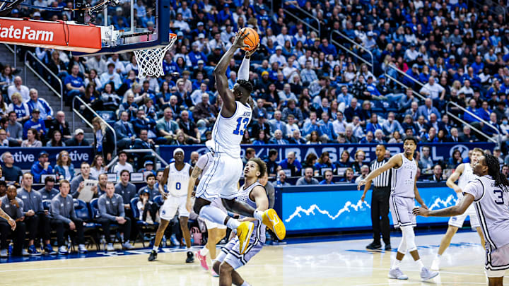 BYU basketball center Keba Keita rises up for a dunk against Kansas State