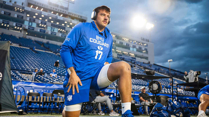 BYU linebacker Jack Kelly warms up for game against WVU