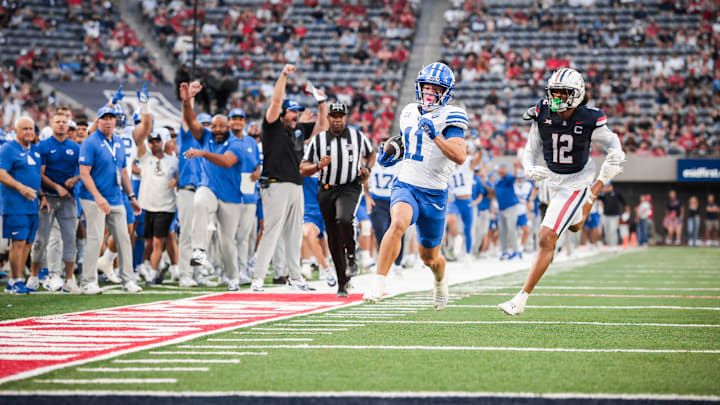 BYU wide receiver Parker Kingston scores a touchdown against Arizona BYU wide receiver Parker Kingston scores a touchdown against Arizona