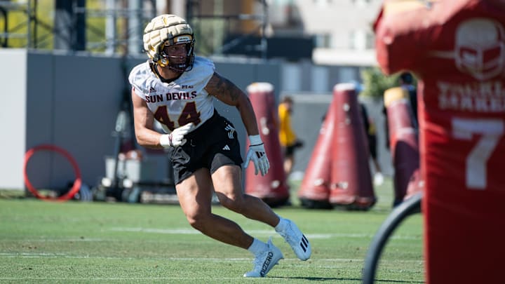 Keyshaun Elliott (44) runs through drills at Sun Devils spring football practice at ASU's Kajikawa practice fields on March 27, 2025, in Tempe, Ariz. Keyshaun Elliott (44) runs through drills at Sun Devils spring football practice at ASU's Kajikawa practice fields on March 27, 2025, in Tempe, Ariz.