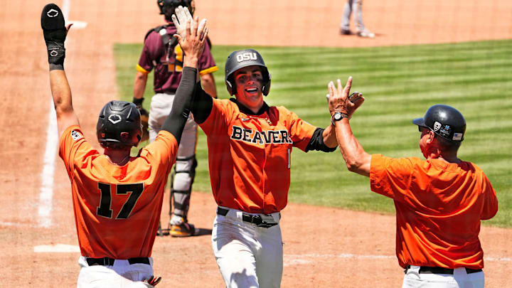 Oregon State's Gavin Turley (1) celebrates after hitting a 3-run inside-the-park home run against Arizona State in the ninth inning during the Pac-12 Tournament at Scottsdale Stadium on May 25, 2023.