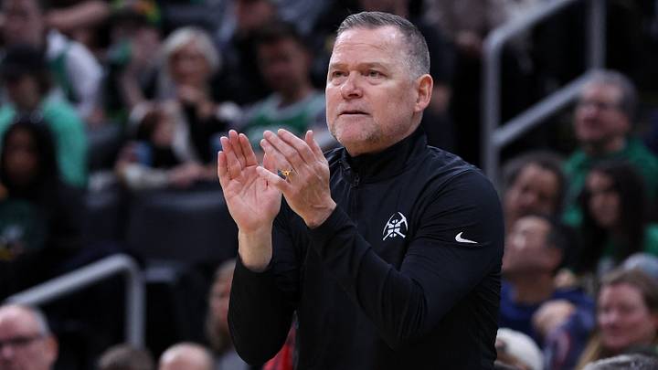 Mar 2, 2025; Boston, Massachusetts, USA; Denver Nuggets head coach Michael Malone reacts during the first half against the Boston Celtics at TD Garden. Mandatory Credit: Paul Rutherford-Imagn Images