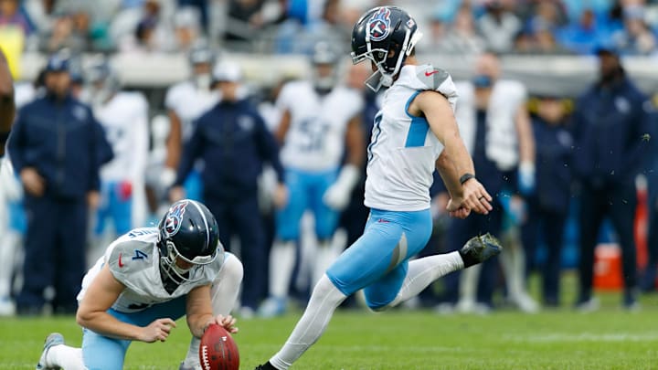 Dec 29, 2024; Jacksonville, Florida, USA; Tennessee Titans punter Ryan Stonehouse (4) holds the ball for kicker Matthew Wright (7) for a field goal attempt against the Jacksonville Jaguars during the fourth quarter at EverBank Stadium. Mandatory Credit: Morgan Tencza-Imagn Images Dec 29, 2024; Jacksonville, Florida, USA; Tennessee Titans punter Ryan Stonehouse (4) holds the ball for kicker Matthew Wright (7) for a field goal attempt against the Jacksonville Jaguars during the fourth quarter at EverBank Stadium. Mandatory Credit: Morgan Tencza-Imagn Images