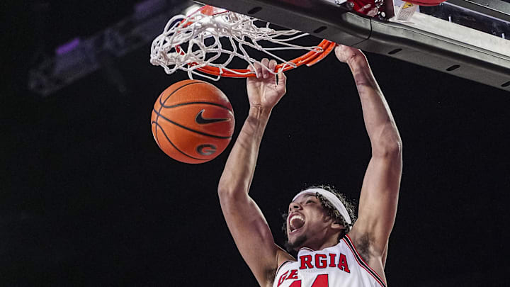 Jan 11, 2025; Athens, Georgia, USA; Georgia Bulldogs forward Asa Newell (14) dunks against the Oklahoma Sooners during the first half at Stegeman Coliseum.