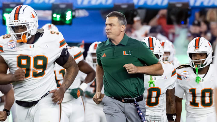 Jan 8, 2026; Glendale, AZ, USA; Miami Hurricanes head coach Mario Cristobal against the Mississippi Rebels during the 2026 Fiesta Bowl and semifinal game of the College Football Playoff at State Farm Stadium. Mandatory Credit: Mark J. Rebilas-Imagn Images