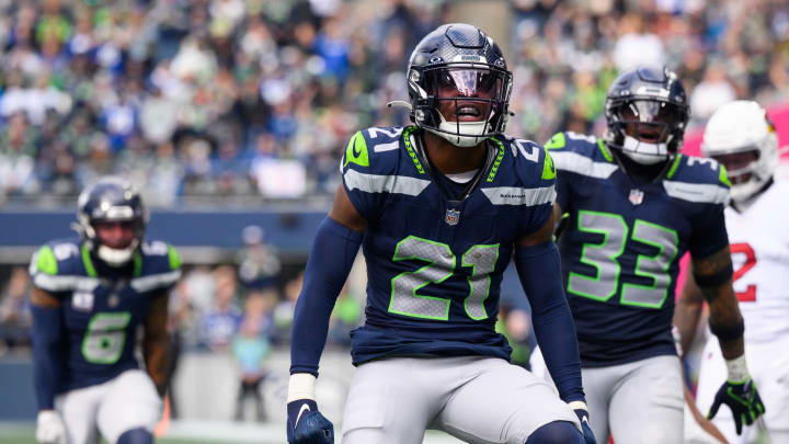 Oct 22, 2023; Seattle, Washington, USA; Seattle Seahawks cornerback Devon Witherspoon (21) celebrates after the defense made a play against the Arizona Cardinals during the second half at Lumen Field. Mandatory Credit: Steven Bisig-USA TODAY Sports